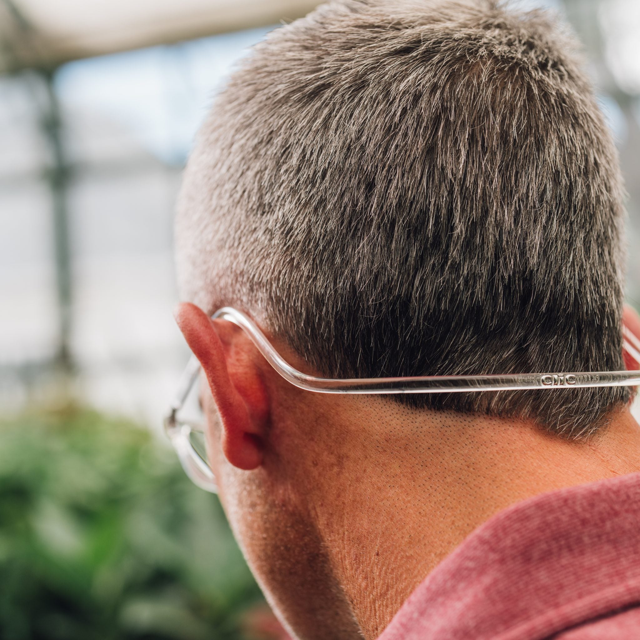 Rear view of the CliC adjustable band resting around the back of a head